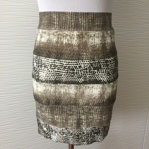 Bebe Three Patterned body con skirt